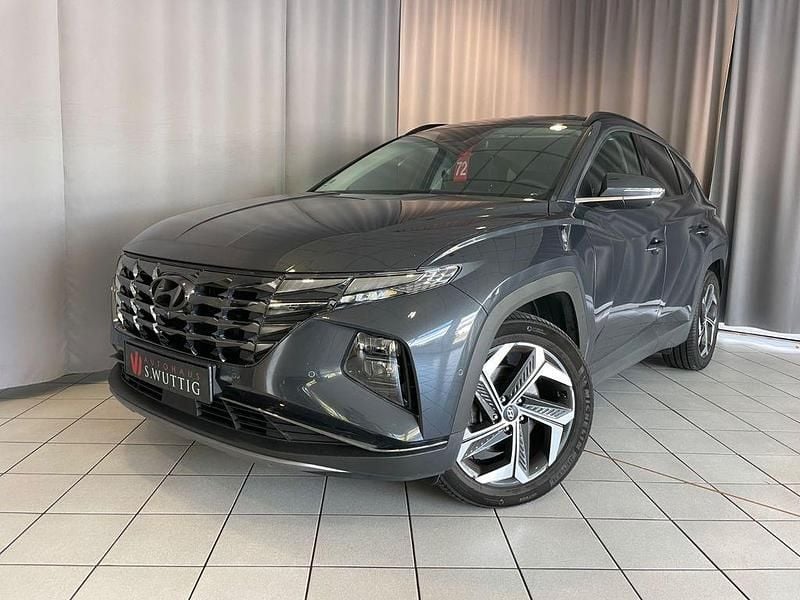 Grau Gebraucht 2021 Hyundai Tucson Prime SUV | 23.990 € (Fairer Preis) - Bild 1/4