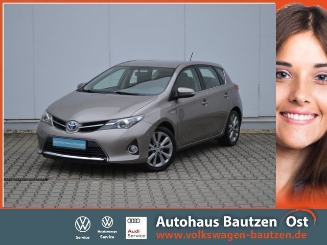Avantgarde bronze metallic Gebraucht 2014 Toyota Auris Hybrid Life+ Limousine | 13.840 € (Fairer Preis) - Bild 1/4