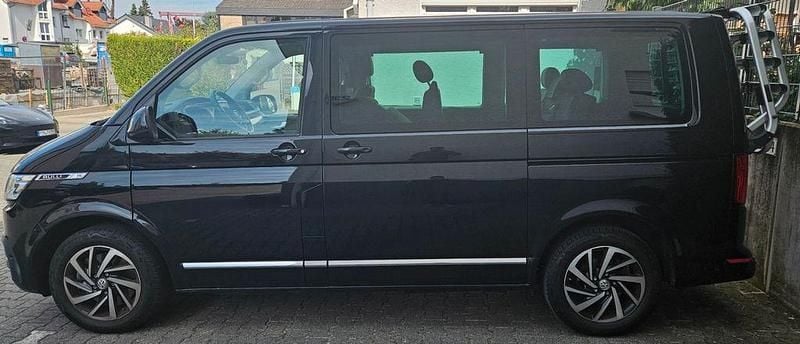 Schwarz Gebraucht 2021 VW Multivan Highline Van / Kleinbus | 60.000 € (Teuer) - Bild 1/4