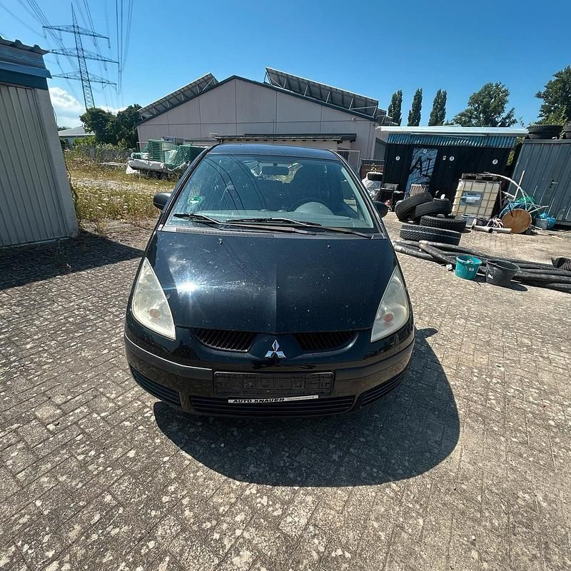 Schwarz Gebraucht 2007 Mitsubishi Colt Kleinwagen | 1.299 € - Bild 1/4