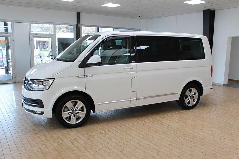 Second-hand VW Multivan Generation Six 150 CP (110 kW) 2015 Alb Monovolum