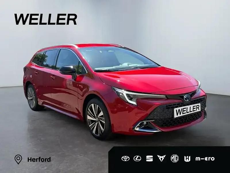 Neu Toyota Corolla Hybrid 196 PS (144 kW) 2026 Karminarot met. sonderfarbe Kombi