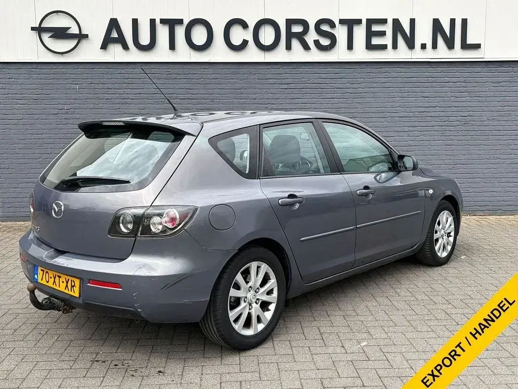 Używany Mazda 3 109 KM (80 kW) 2007 Szary Sedan/Limuzyna