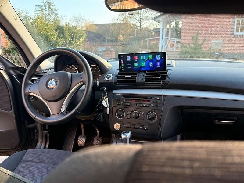 Gebraucht BMW 116 122 PS (89 kW) 2010 Schwarz Kleinwagen