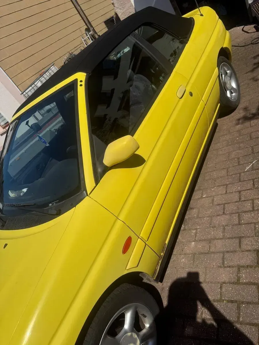 Gebraucht Ford Escort Cabriolet 90 PS (66 kW) 1996 Gelb Cabrio