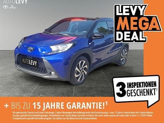 Juniper blue metallic/ night sky black Gebraucht 2022 Toyota Aygo X Comfort SUV | 13.444 € (Guter Preis) - Bild 1/4