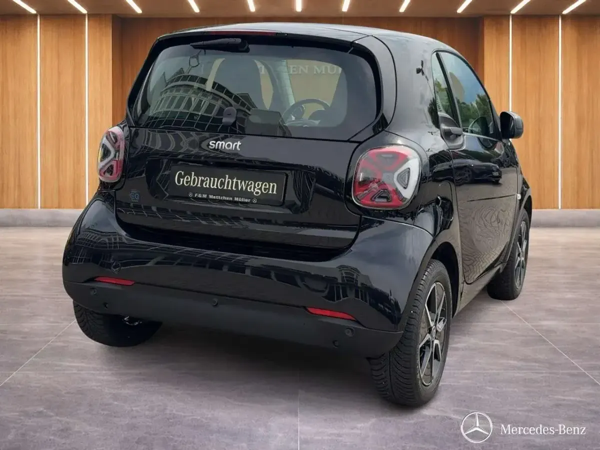 Gebraucht Smart ForTwo Electric Drive Passion 60 kW (82 PS) 2024 Bodypanels in black Coupé