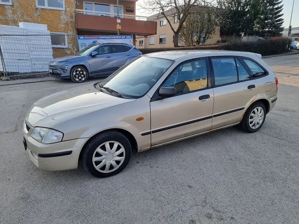 Gebraucht Mazda 323 88 PS (64 kW) 1998 Grau Limousine