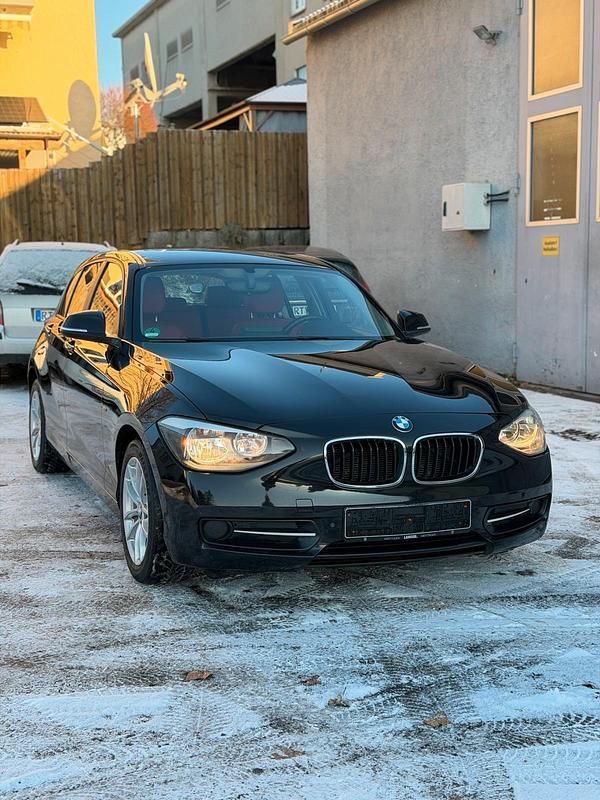 Schwarz Gebraucht 2012 BMW 116 Sport Line Kleinwagen | 6.200 € (Fairer Preis) - Bild 1/4