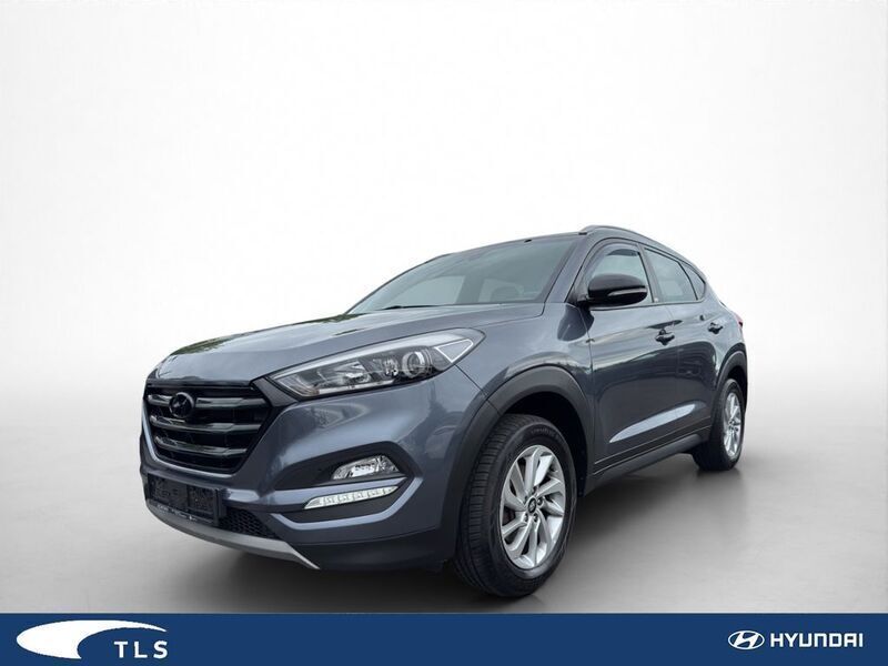 Grau Gebraucht 2018 Hyundai Tucson Passion SUV | 14.490 € (Guter Preis) - Bild 1/4