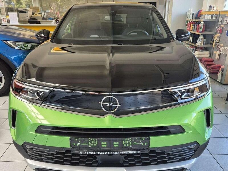 Gebraucht Opel Mokka-e Ultimate 100 kW (136 PS) 2021 Matcha green/ikone gruen SUV