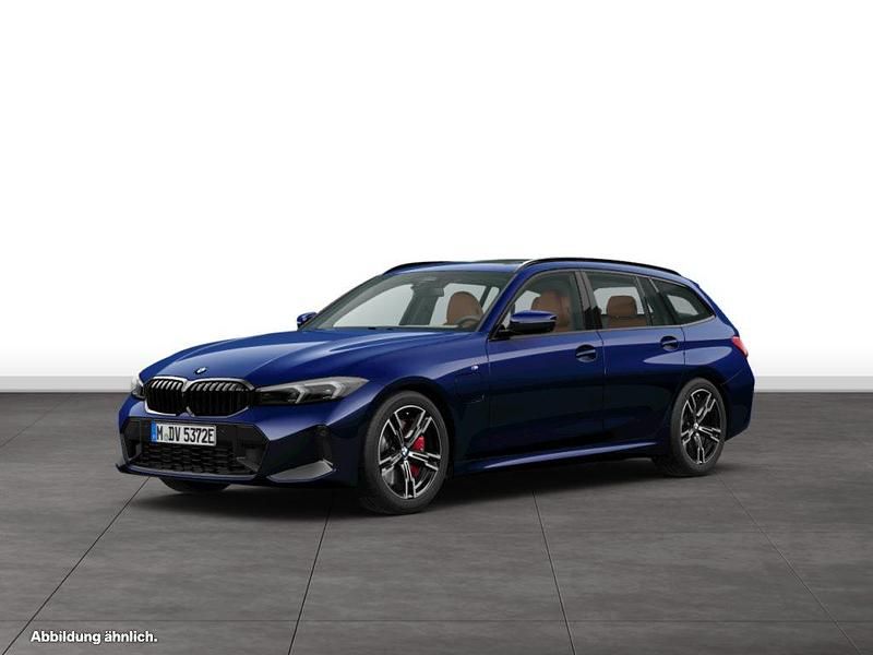 Blau Gebraucht 2024 BMW 330e Kombi | 58.079 € - Bild 1/4
