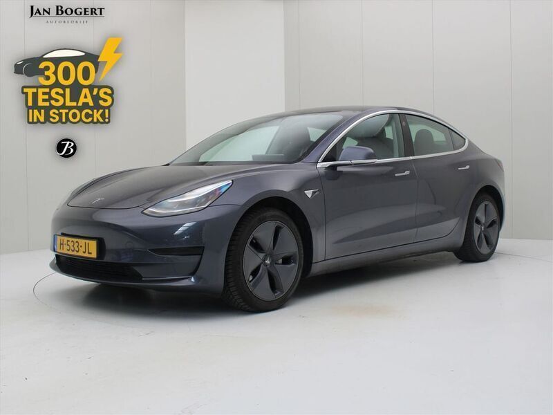 Grau Gebraucht 2020 Tesla Model 3 Standard Range Limousine | 19.400 € (Fairer Preis) - Bild 1/4