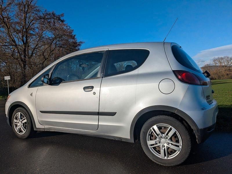 Gebraucht Mitsubishi Colt 75 PS (55 kW) 2011 Silber Kleinwagen