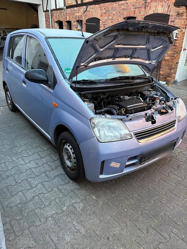 Gebraucht Daihatsu Cuore 70 PS (51 kW) 2004 Blau Kleinwagen