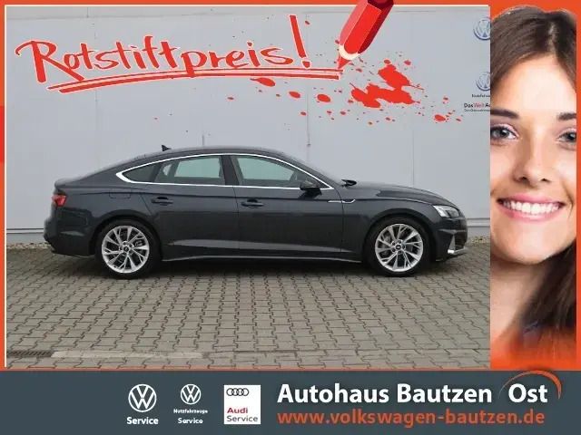 Grau (manhattangrau metallic) Gebraucht 2021 Audi A5 Sportback Advanced Limousine | 32.840 € (Fairer Preis) - Bild 1/4
