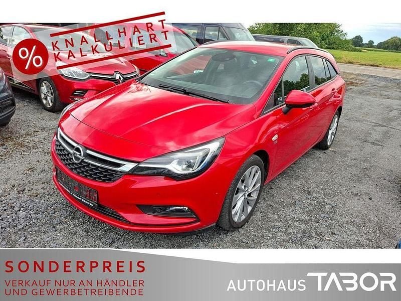 Lava rot Gebraucht 2019 Opel Astra Kombi | 9.985 € (Superpreis) - Bild 1/4