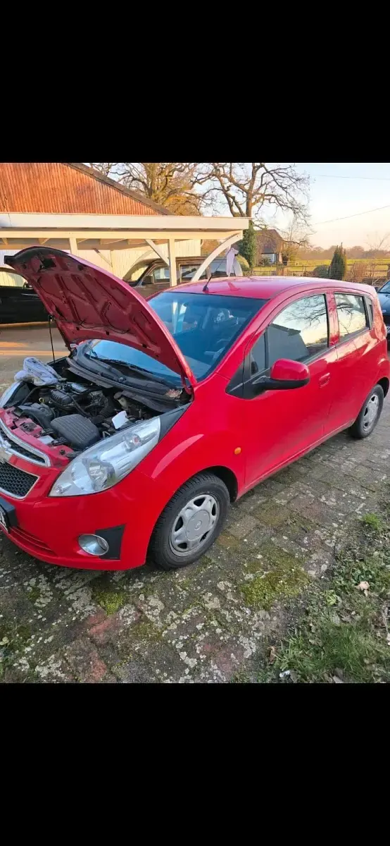 Używany Chevrolet Spark 60 KM (44 kW) 2011 Czerwony Hatchback