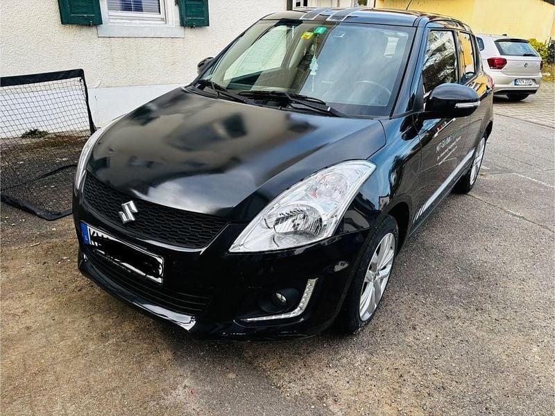 Gebraucht Suzuki Swift 94 PS (69 kW) 2015 Schwarz Kleinwagen