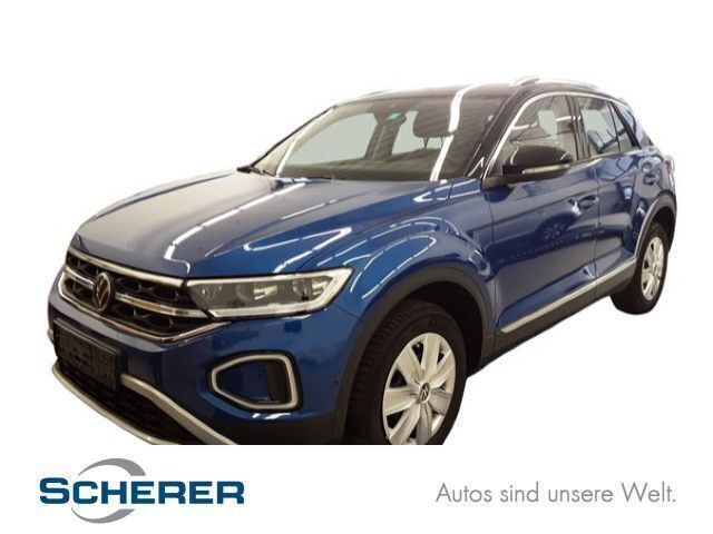 Ravennablaumetallic/schwarz (metallic) Gebraucht 2024 VW T-Roc Style SUV | 27.290 € (Guter Preis) - Bild 1/4