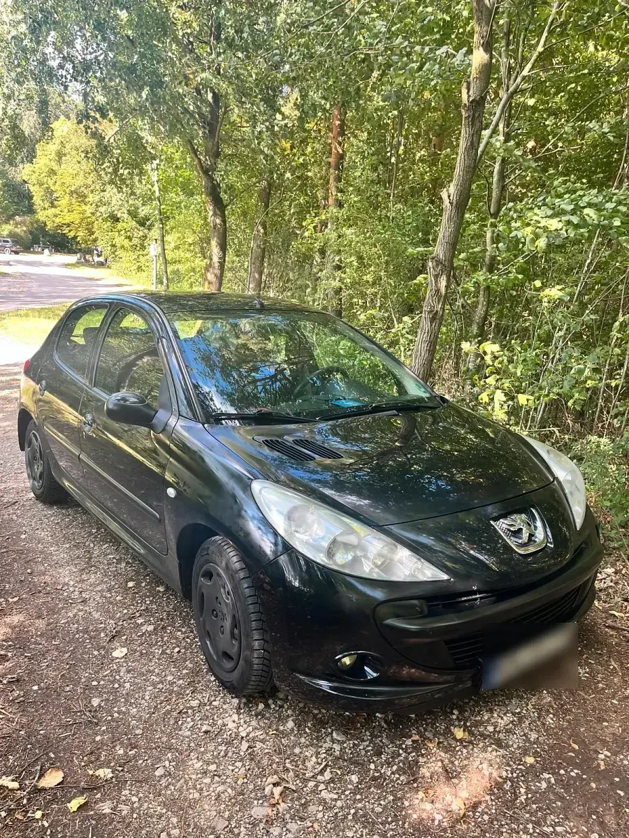 Gebraucht Peugeot 206 75 PS (55 kW) 2010 Schwarz Kleinwagen