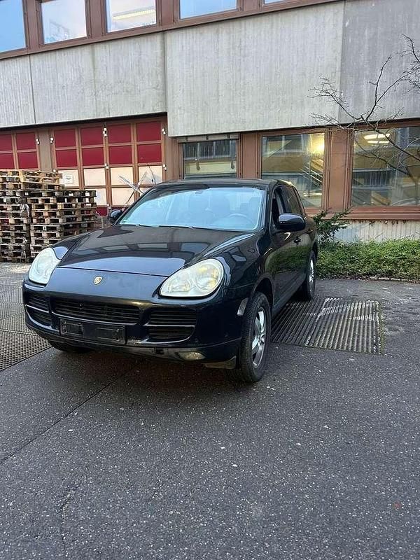 Basaltschwarzmetallic Gebraucht 2006 Porsche Cayenne Basis SUV | 2.500 € - Bild 1/4