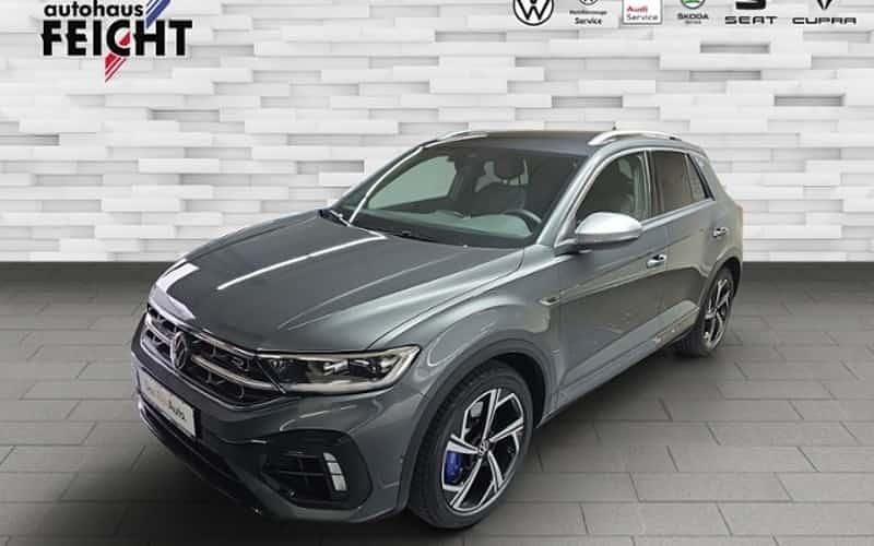 Grau (indiumgrau metallic) Gebraucht 2023 VW T-Roc R SUV | 35.100 € (Fairer Preis) - Bild 1/4