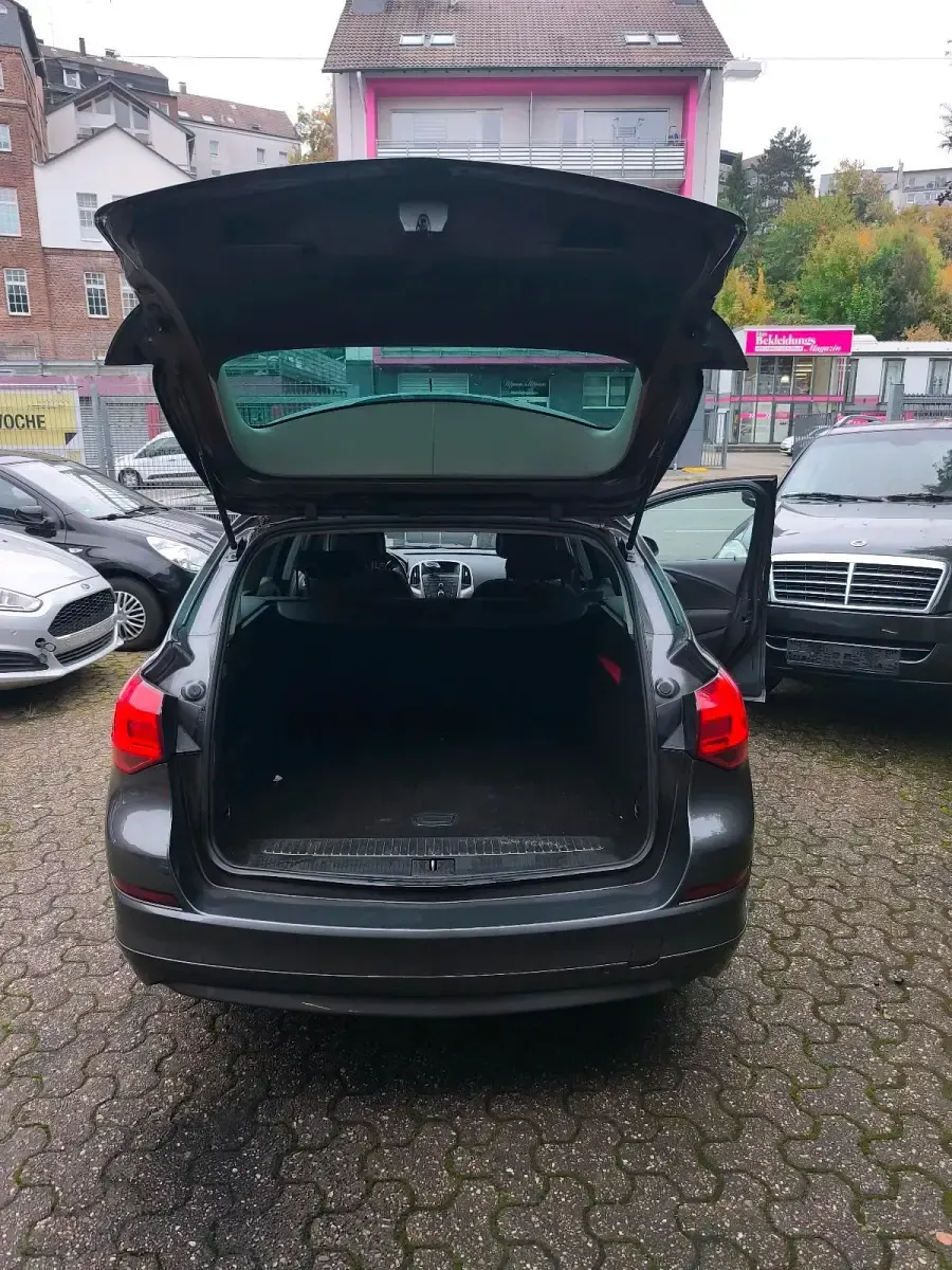 Gebraucht Opel Astra 125 PS (91 kW) 2011 Grau Kombi