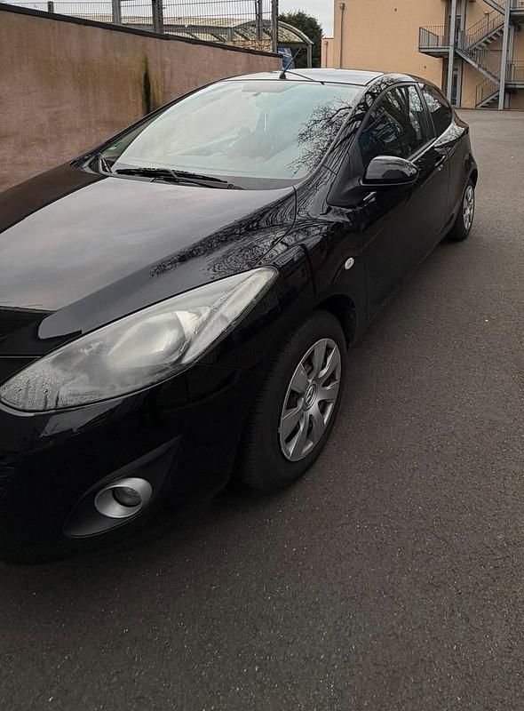 Gebraucht Mazda 2 75 PS (55 kW) 2011 Schwarz Kleinwagen
