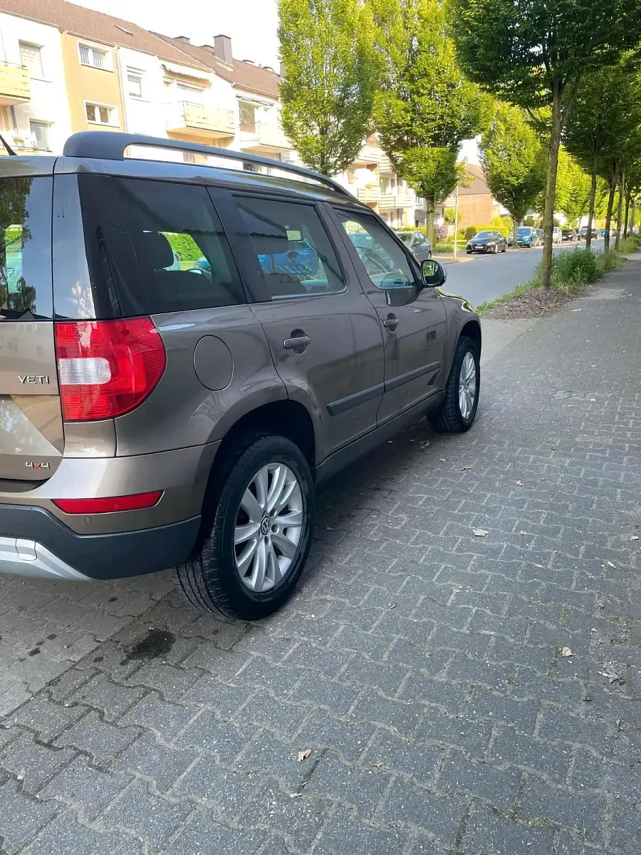 Używany Skoda Yeti 150 KM (110 kW) 2015 Brązowy SUV