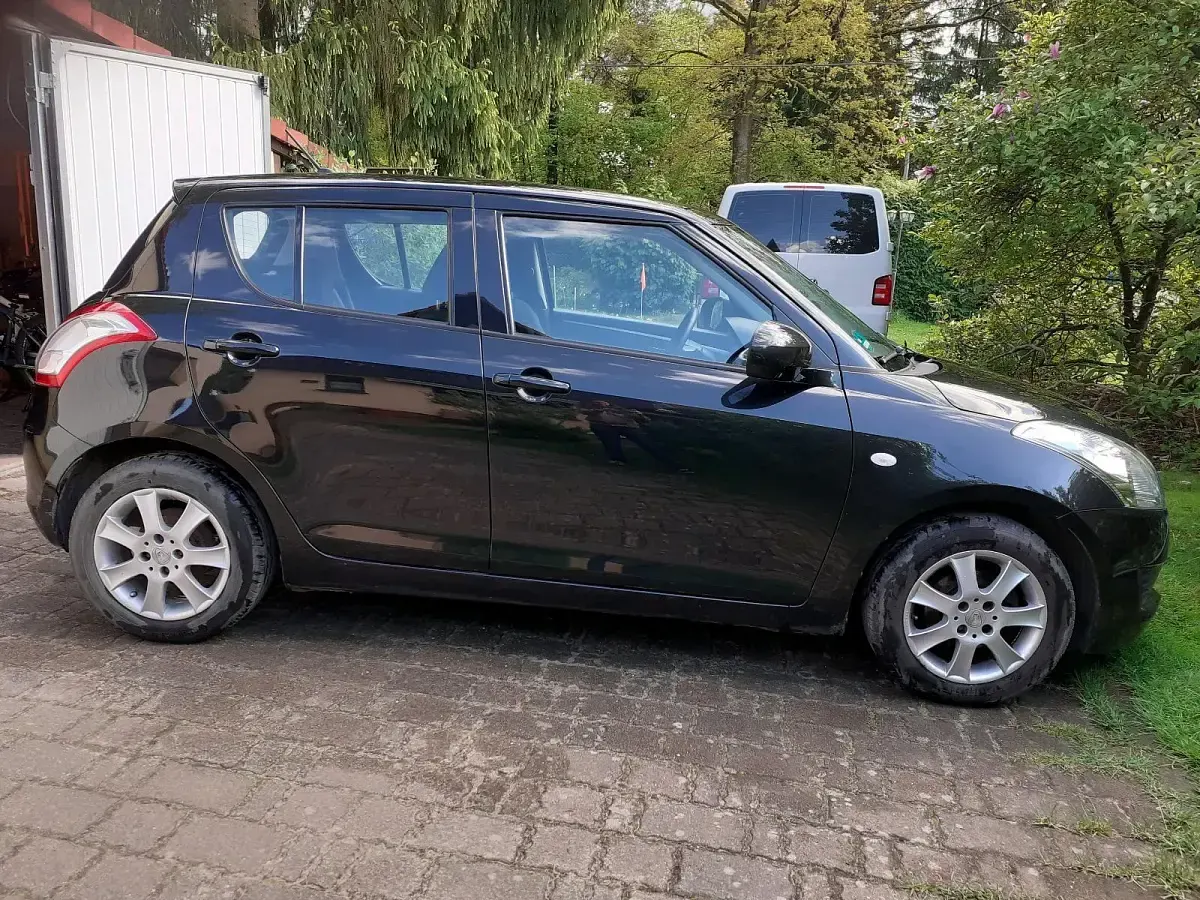Gebraucht Suzuki Swift 94 PS (69 kW) 2014 Schwarz Kleinwagen