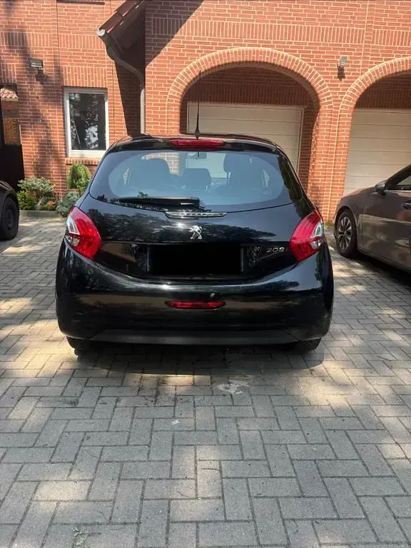 Gebraucht Peugeot 208 Active 68 PS (50 kW) 2013 Schwarz Kleinwagen