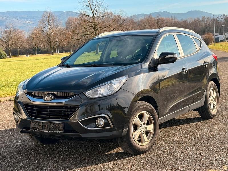 Schwarz Gebraucht 2012 Hyundai ix35 Style SUV | 5.490 € - Bild 1/4