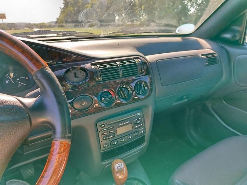 Gebraucht Ford Escort Cabriolet 90 PS (66 kW) 1997 Grün Cabrio