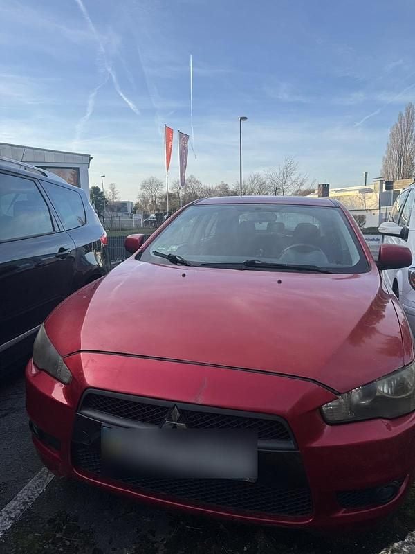 Rot Gebraucht 2009 Mitsubishi Lancer Kleinwagen | 3.300 € (Superpreis) - Bild 1/4