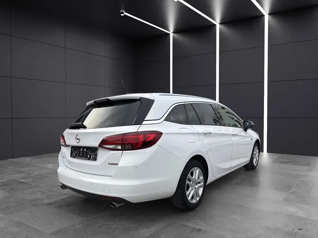 Gebraucht Opel Astra Dynamic 200 PS (147 kW) 2016 Schneeweiss/summitwhite/arctic Kombi