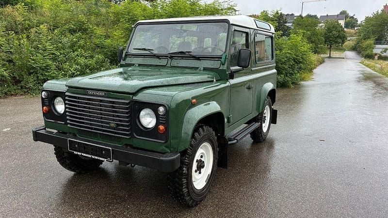 Grün Gebraucht 1999 Land Rover Defender SUV | 28.500 € (Guter Preis) - Bild 1/4