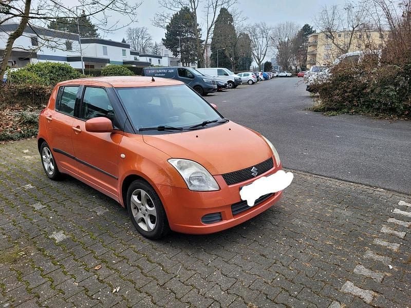 Orange Gebraucht 2006 Suzuki Swift Limousine | 2.250 € (Fairer Preis) - Bild 1/4