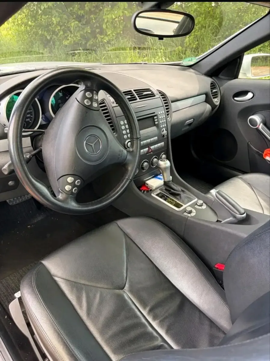 Second-hand Mercedes SLK200 163 CP (119 kW) 2005 Argintiu Cabrio