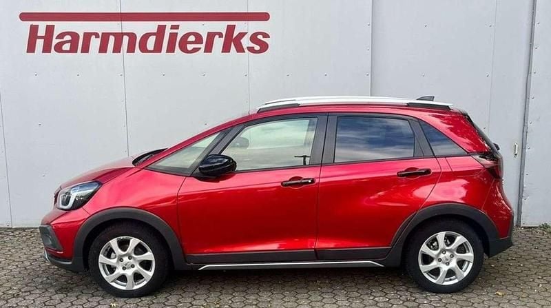 Gebraucht Honda Jazz Advance 122 PS (89 kW) 2023 Premium crystal red metallic (metallic) Kleinwagen