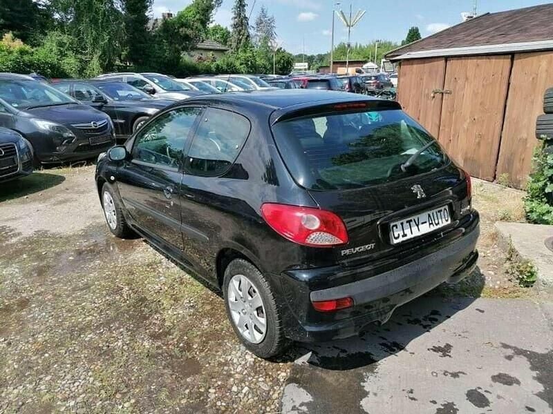 Gebraucht Peugeot 206+ Basis 68 PS (50 kW) 2010 Schwarz Kleinwagen