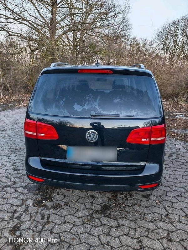 Gebraucht VW Touran Cross 105 PS (77 kW) 2011 Schwarz Van / Kleinbus