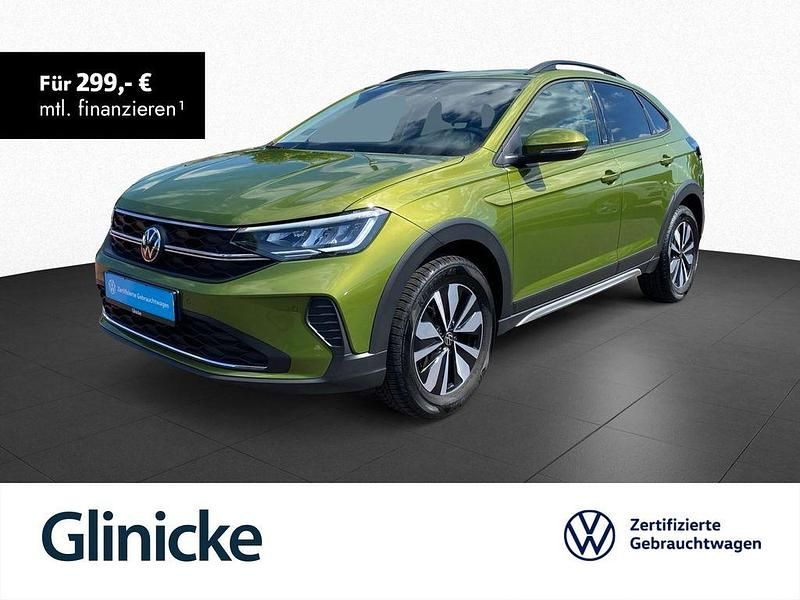 Visual green metallic Gebraucht 2024 VW Taigo Move SUV | 21.433 € (Fairer Preis) - Bild 1/3