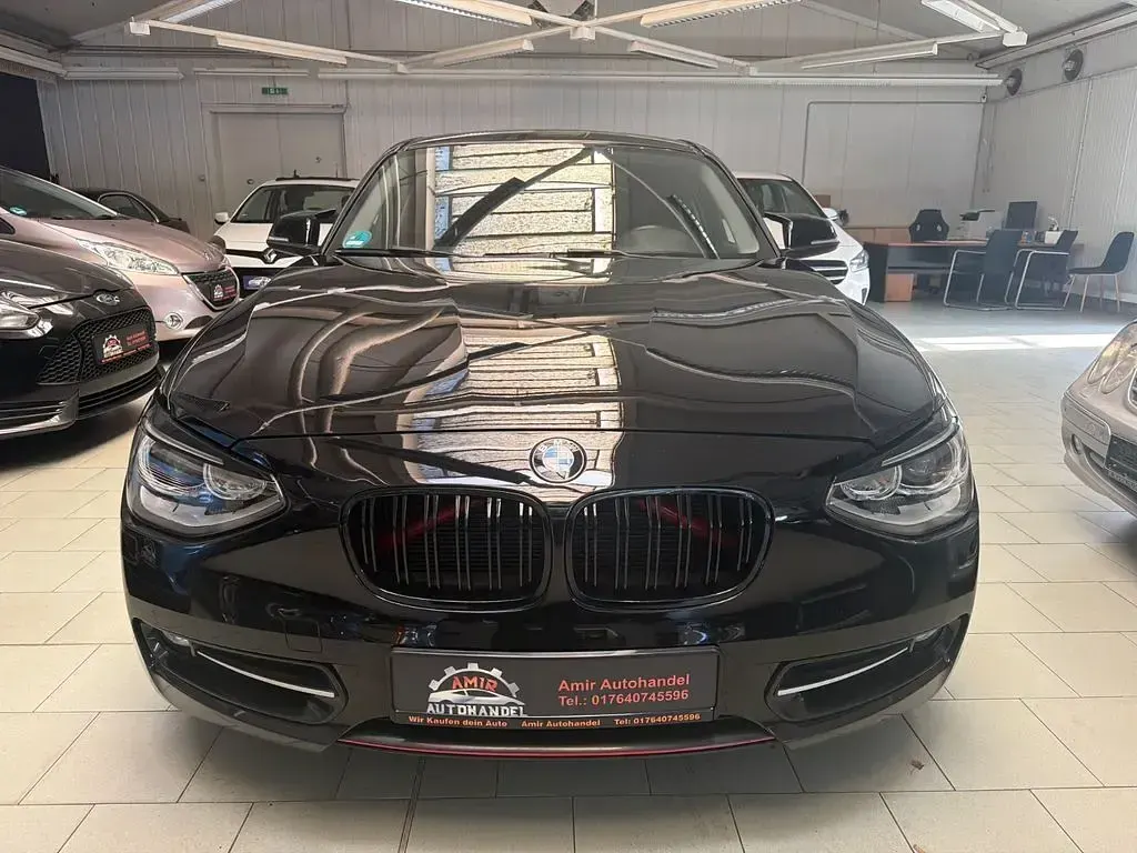 Używany BMW 116 Performance 136 KM (100 kW) 2012 Czarny Hatchback