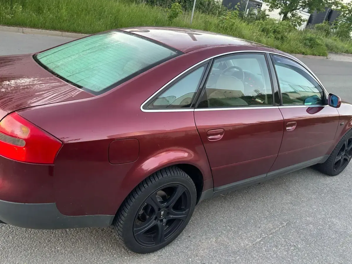 Używany Audi A6 150 KM (110 kW) 1999 Czerwony Sedan/Limuzyna