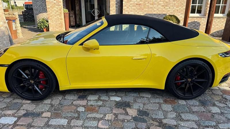 Gelb Gebraucht 2024 Porsche 911 Carrera S Cabriolet Cabrio | 139.800 € (Superpreis) - Bild 1/4