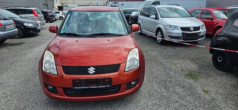 Orange Gebraucht 2009 Suzuki Swift Comfort Limousine | 1.750 € (Superpreis) - Bild 1/4