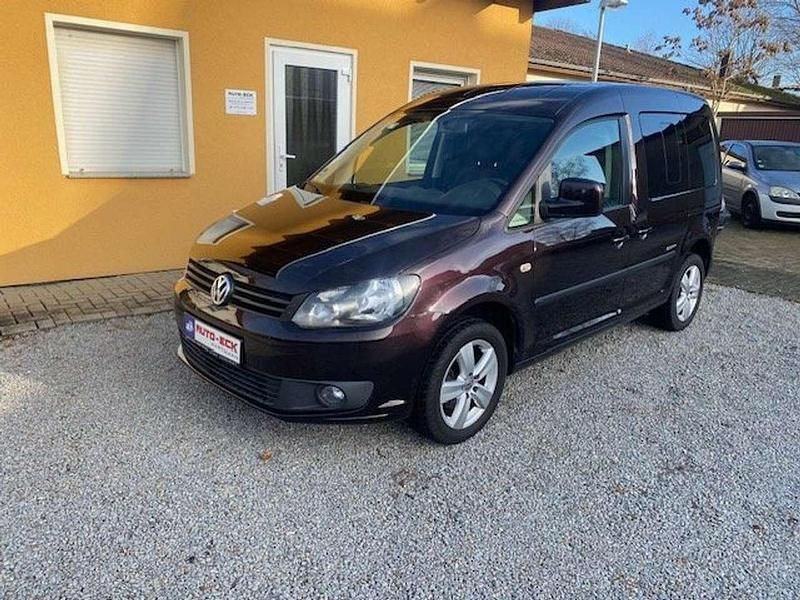 Black berry metallic Gebraucht 2014 VW Caddy Van / Kleinbus | 11.500 € (Teuer) - Bild 1/4