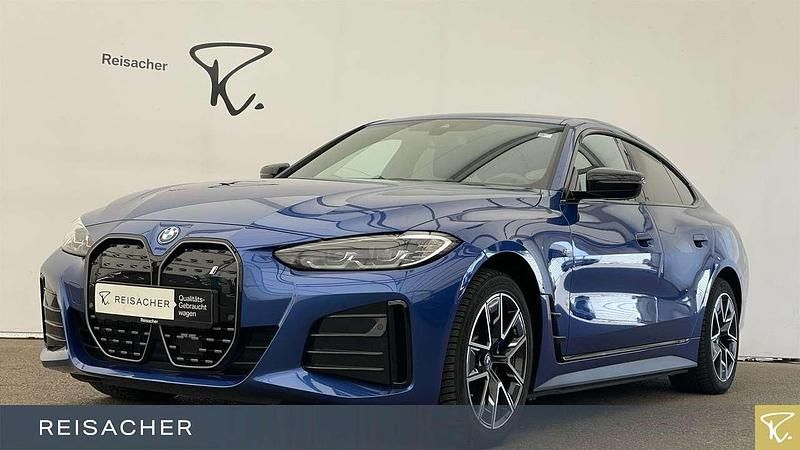 M portimao blau metallic Gebraucht 2023 BMW i4 Shadowline Limousine | 41.440 € (Fairer Preis) - Bild 1/4