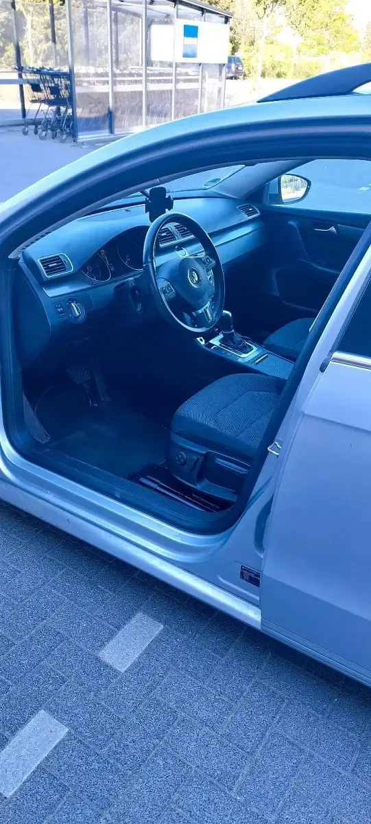 Second-hand VW Passat 140 CP (102 kW) 2013 Argintiu Break